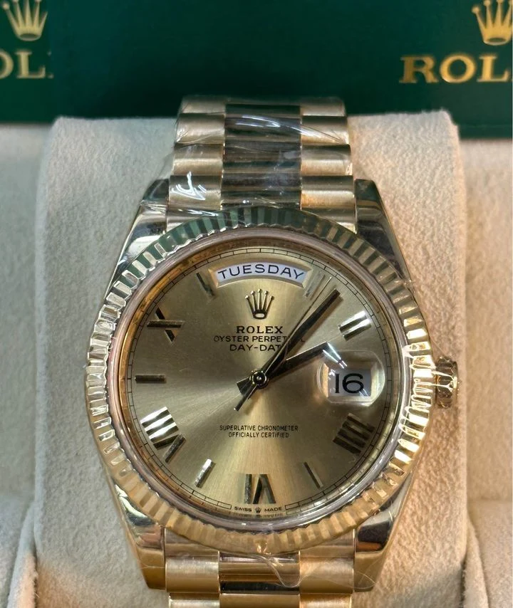 Rolex Day-Date 40mm 228238 Presidential Champagne Dial